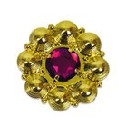 Baretspeld rond met rode steen